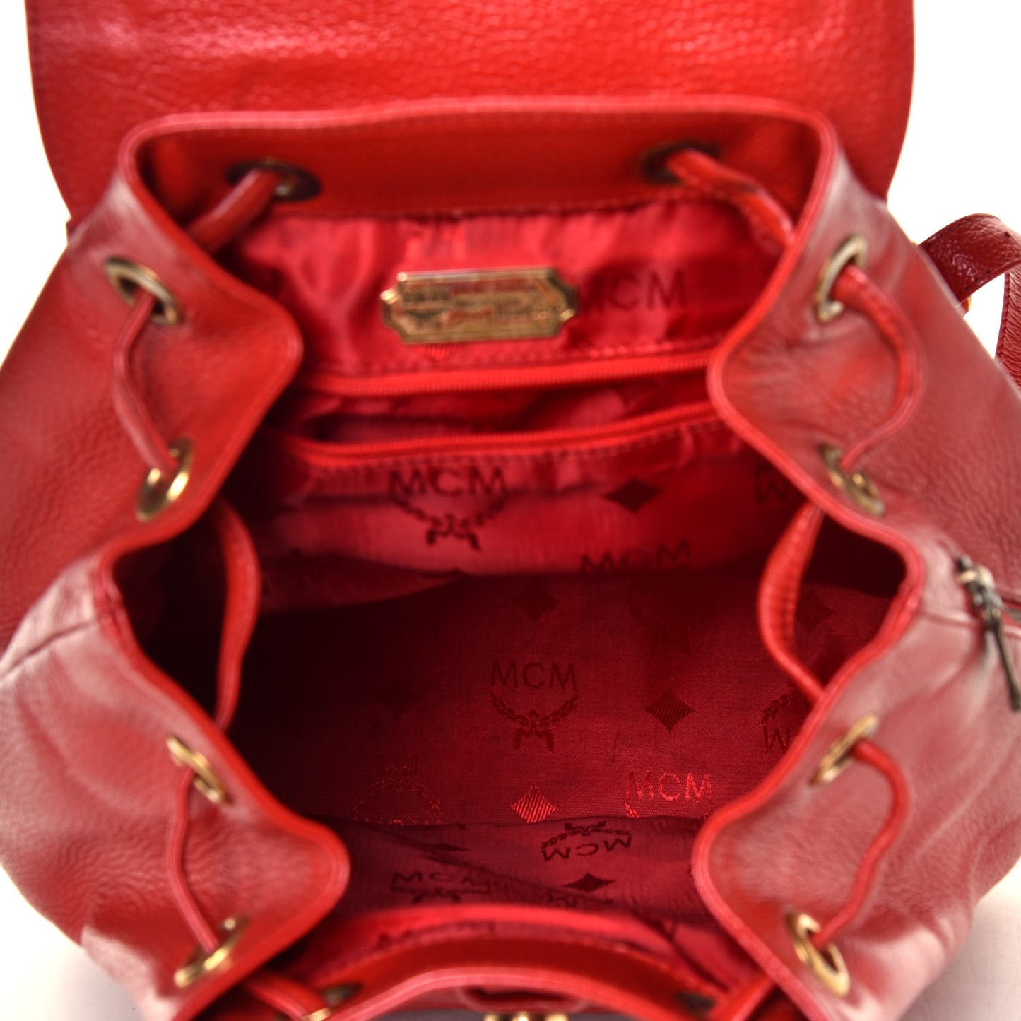 Grained Calfskin Studded Drawstring Backpack Red