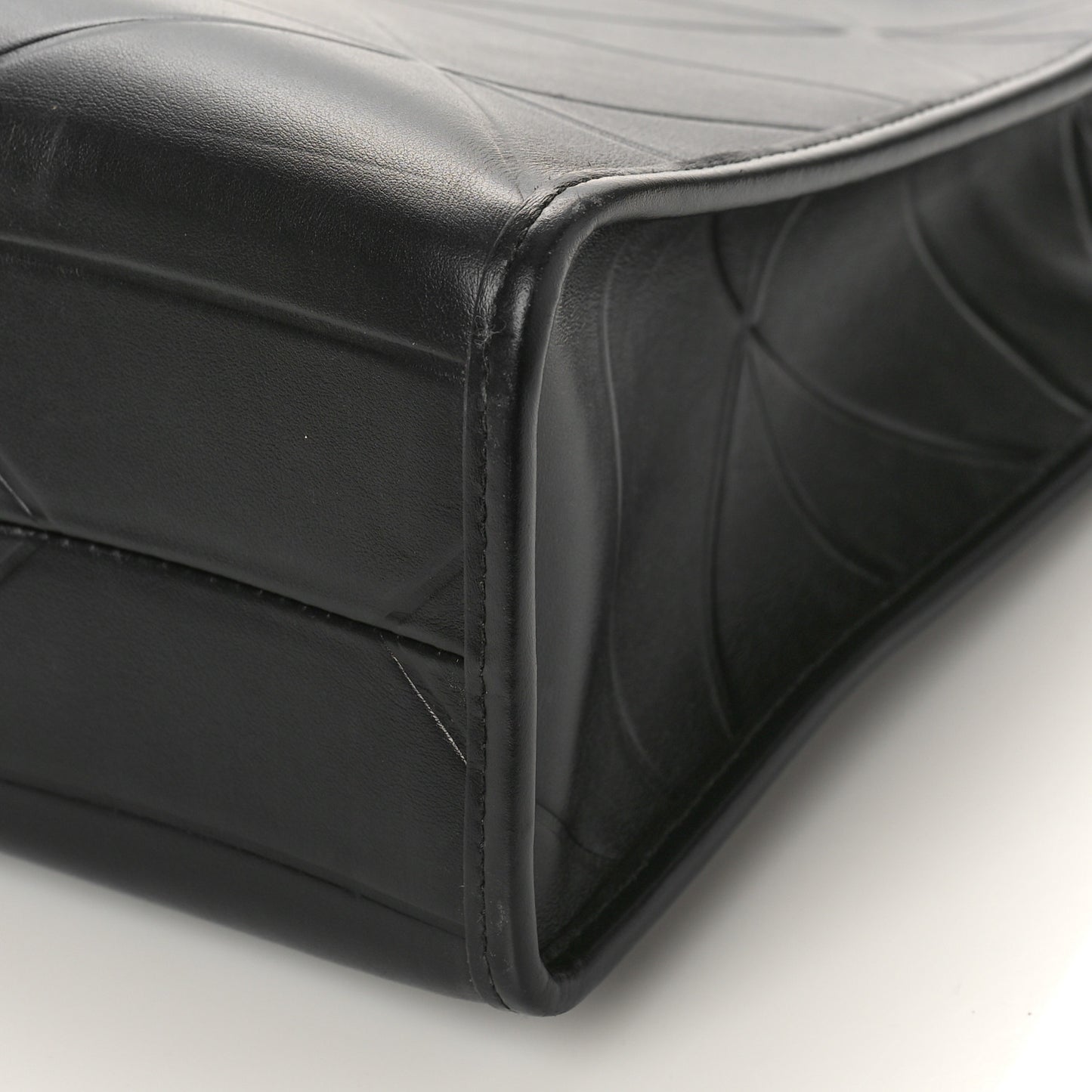 Soft Calfskin Triangolo Symbole Embossed Medium Tote Black