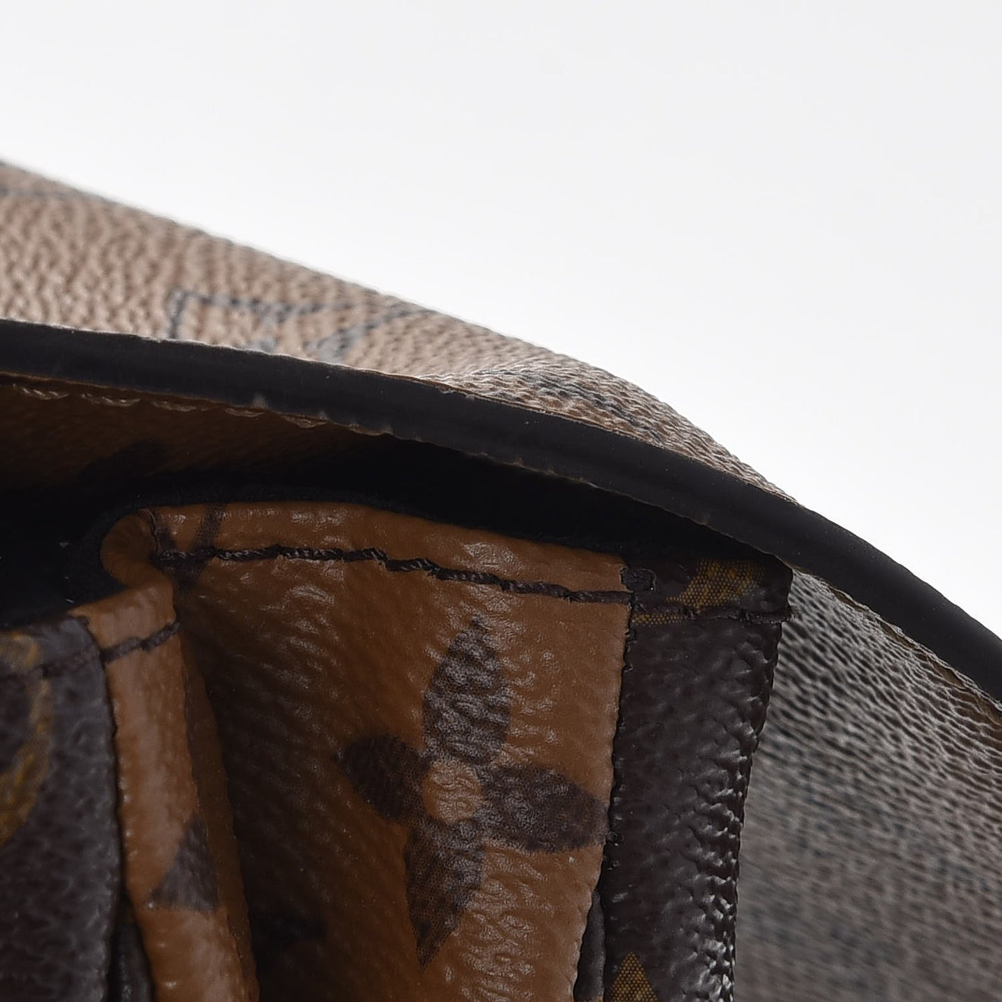 Reverse Monogram Pochette Metis