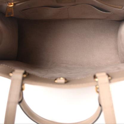 Louis Vuitton Empreinte Monogram Giant Onthego MM Tourterelle 5 of 9