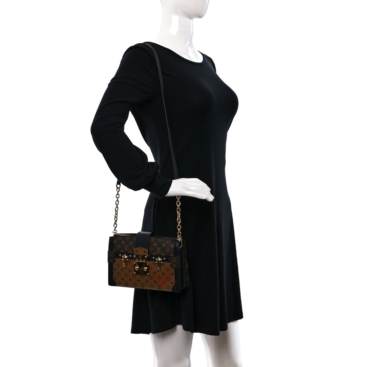 Reverse Monogram Trunk Clutch