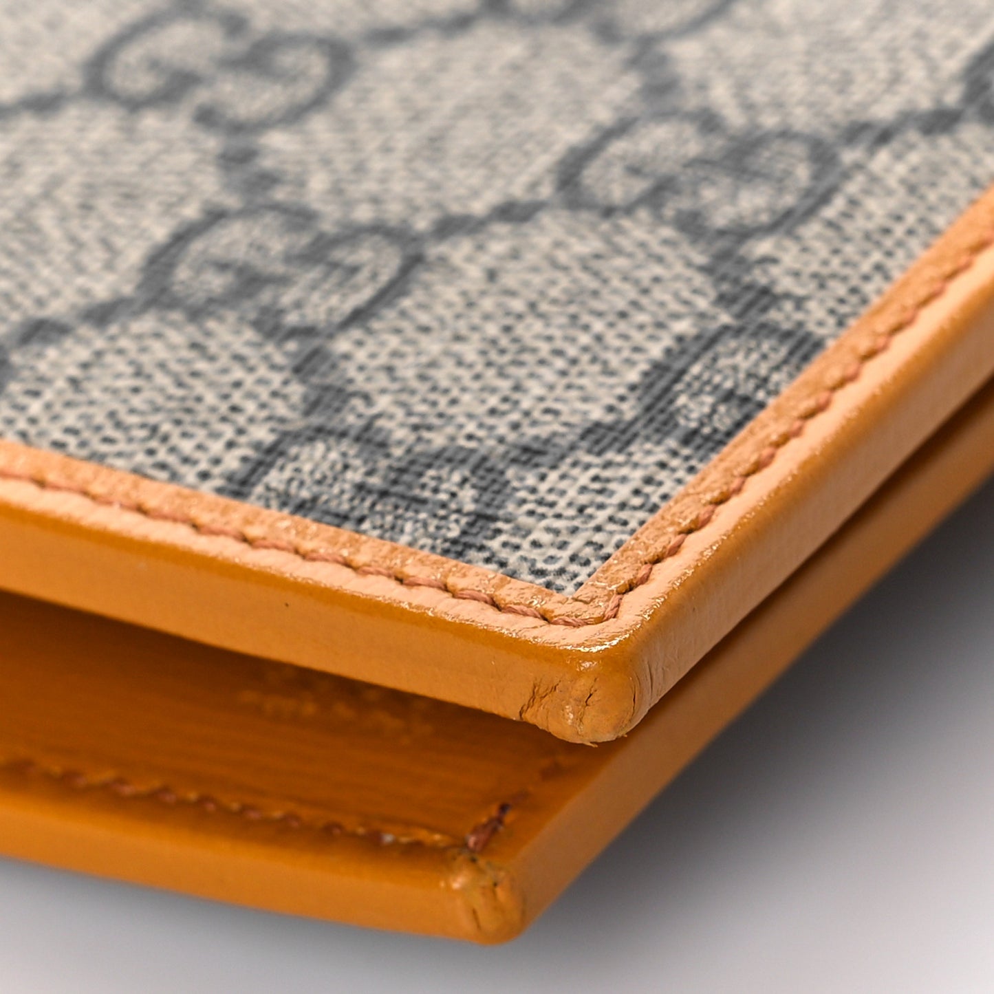 GG Supreme Monogram Textured Calfskin Retro Interlocking G Passport Case Beige Yellow
