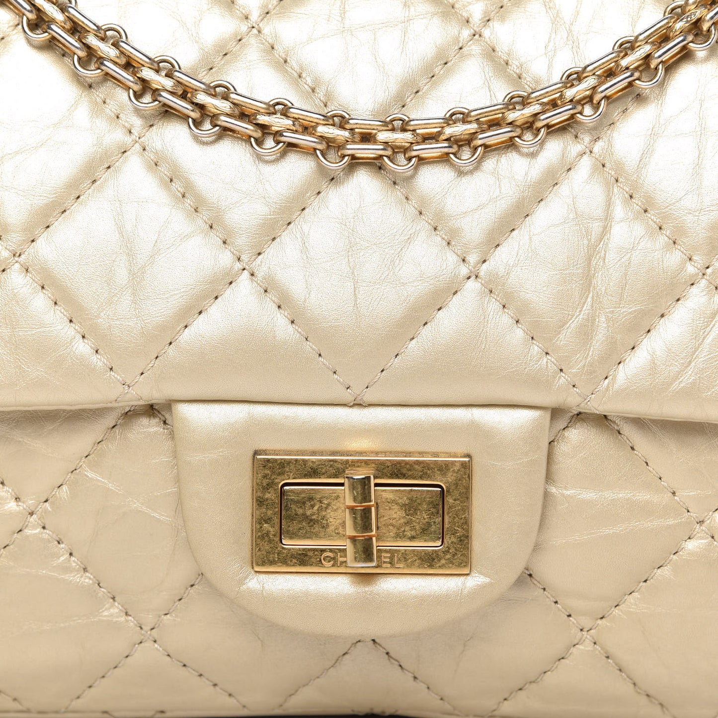 Metallic Aged Calfskin Quilted 2.55 Reissue Flap Light Gold