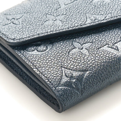 Louis Vuitton Metallic Empreinte Monogram Crystal Flower Sarah Wallet Navy Blue 7 of 8