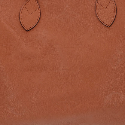 Louis Vuitton Empreinte Monogram Giant Neverfull MM Cognac 8 of 10