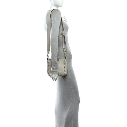Valentino Garavani Pebbled Calfskin Mini Rockstud Flip-Lock Messenger Bag Pastel Grey 2 of 9