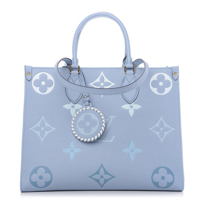 Louis Vuitton Empreinte Monogram Giant By The Pool Onthego MM Summer Blue 1 of 10