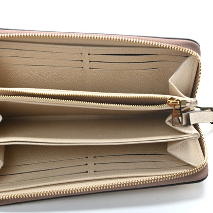 Louis Vuitton Empreinte Monogram Giant Zippy Wallet Creme Bois De Rose 6 of 9