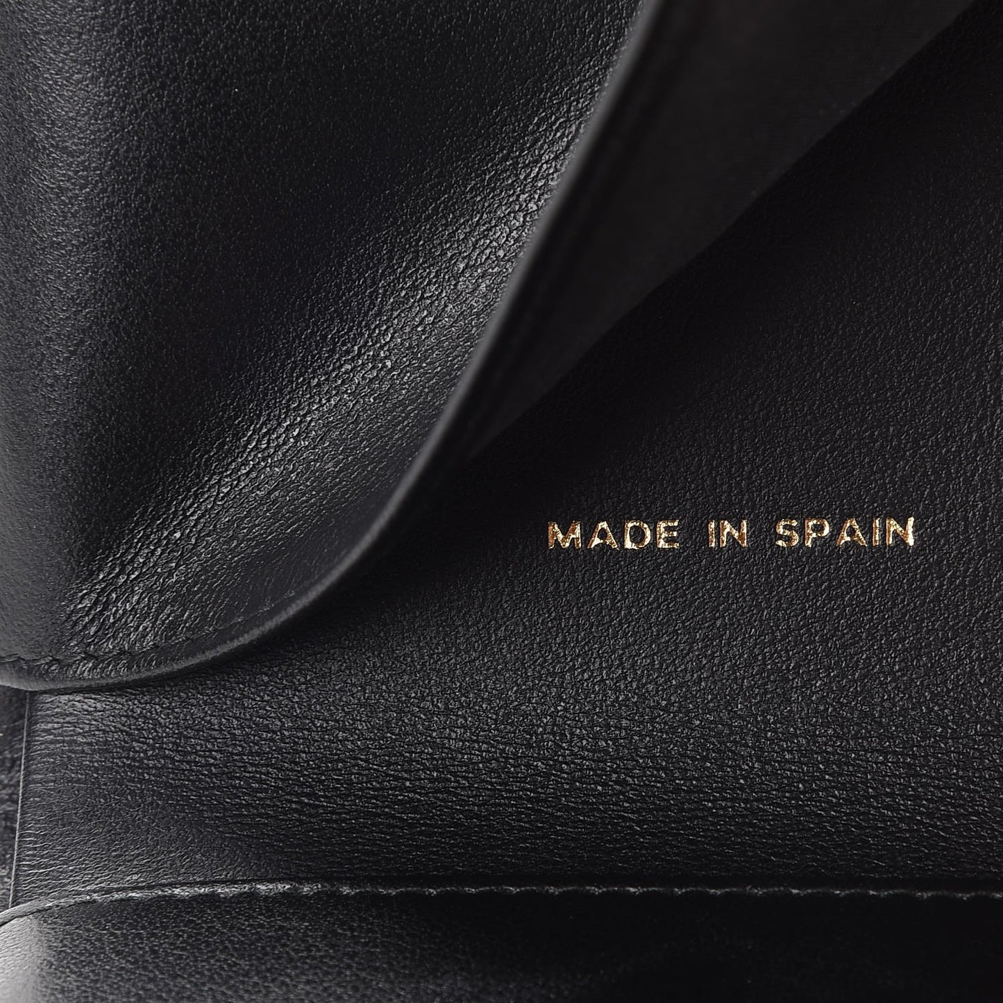 Caviar Quilted Compact Boy Wallet Black