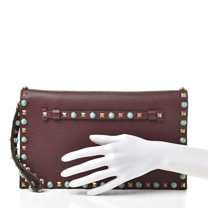 Valentino Garavani Pebbled Calfskin Rockstud Rolling Wristlet Clutch Rubin 2 of 11
