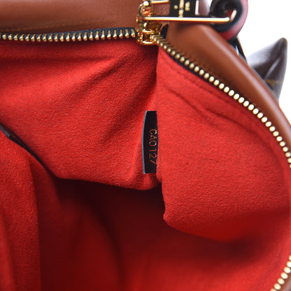 Louis Vuitton Monogram Tuileries Pochette Caramel 7 of 8