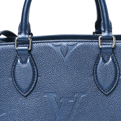 Louis Vuitton Metallic Empreinte Monogram Giant Onthego PM Navy Nacre 7 of 9