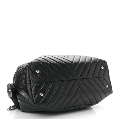 Chanel Aged Calfskin Chevron Quilted Duffle Bag Black 3 of 9