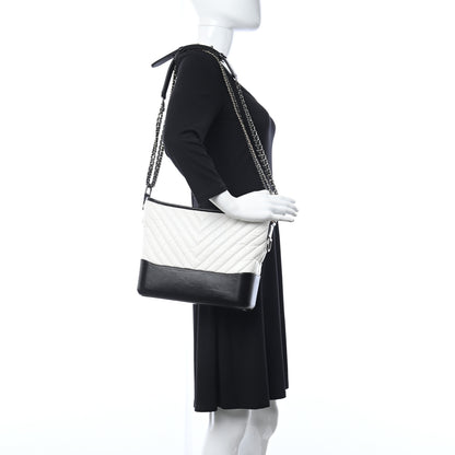 Chanel Aged Calfskin Chevron Quilted Medium Gabrielle Hobo White Black 2 of 10