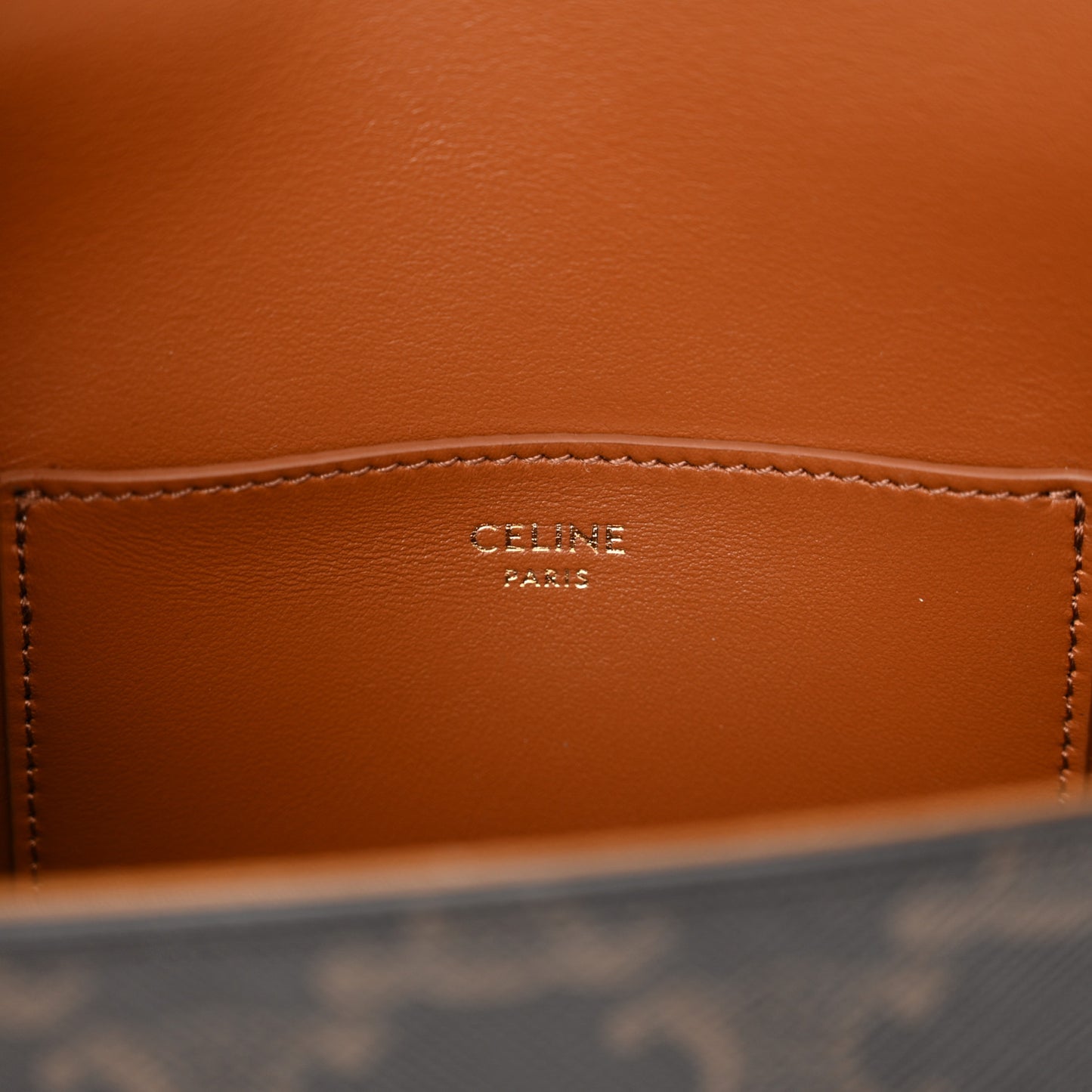 Triomphe Canvas Calfskin Tabou Clutch on Strap Tan