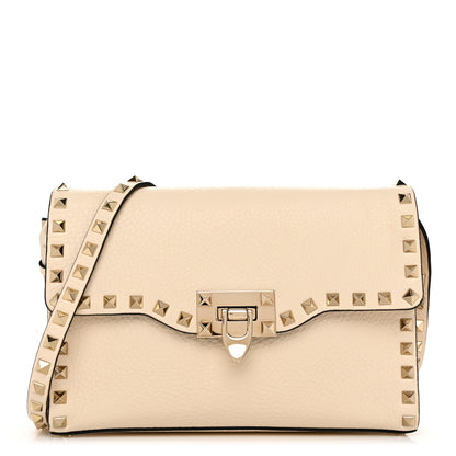 Valentino Garavani Pebbled Calfskin Medium Rockstud Flip Lock Crossbody Bag Light Ivory 1 of 10