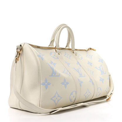 Louis Vuitton Empreinte Monogram Keepall Bandouliere 45 Latte Candy Blue 2 of 9