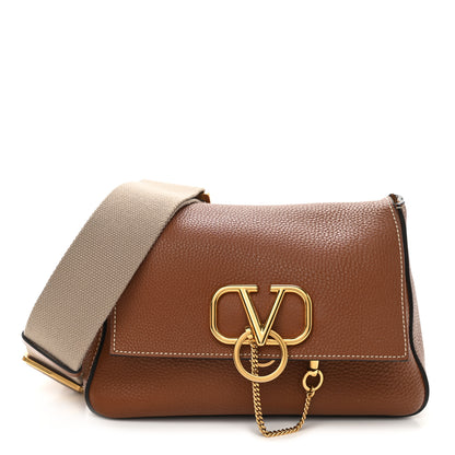 Valentino Garavani Pebbled Calfskin Small VRing Shoulder Bag Saddle Brown 1 of 8