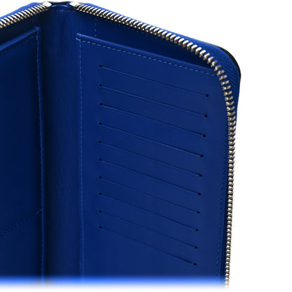 Louis Vuitton Taurillon Illusion Zippy Vertical Wallet Bleu Rose 7 of 9