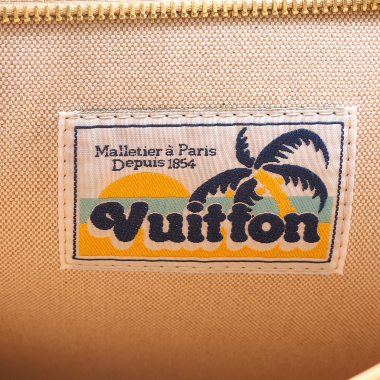 Monogram Surfin' Pochette Voyage Sand