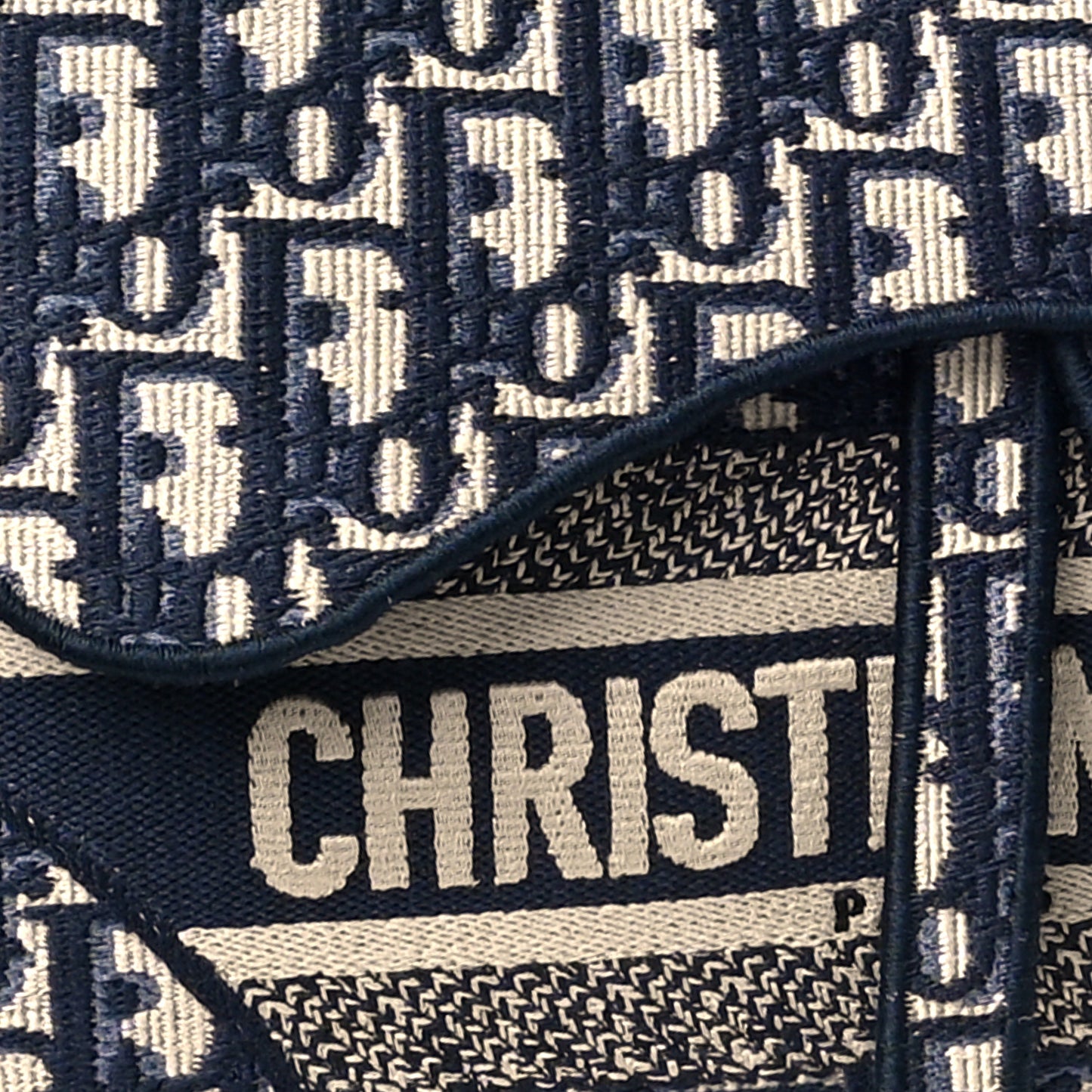 Oblique Embroidered Saddle Bag Blue