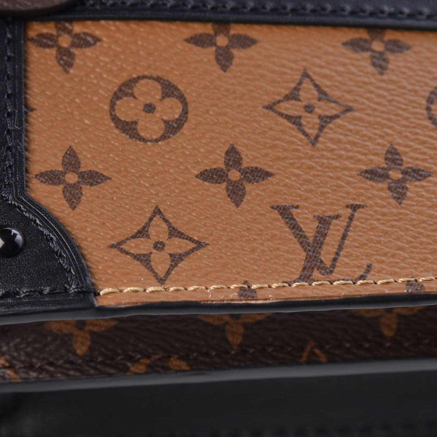 Reverse Monogram Trunk Clutch