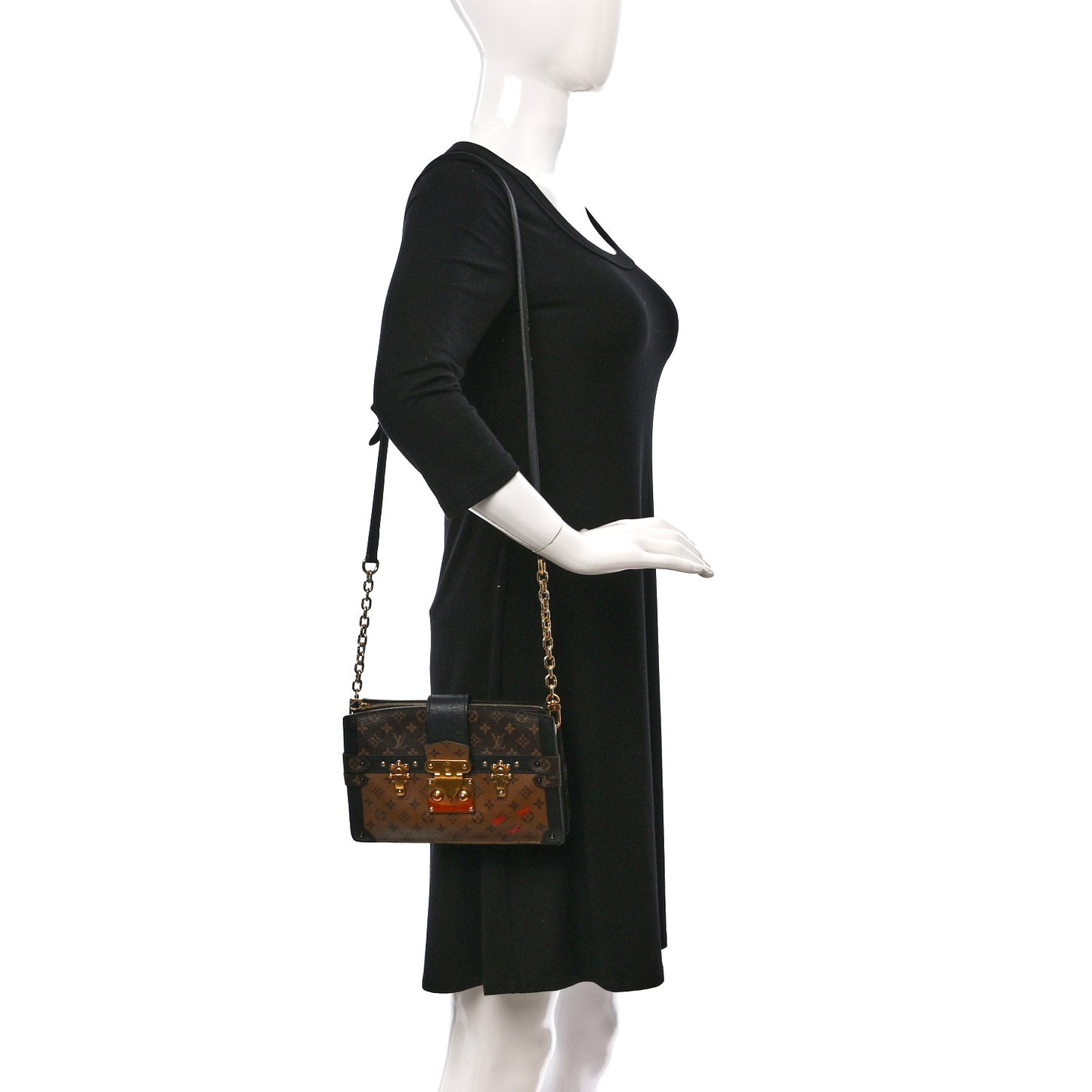 Reverse Monogram Trunk Clutch