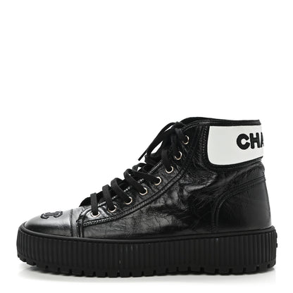 Chanel Aged Calfskin Lace Up Cap Toe Sneakers 40 Black White 1 of 8