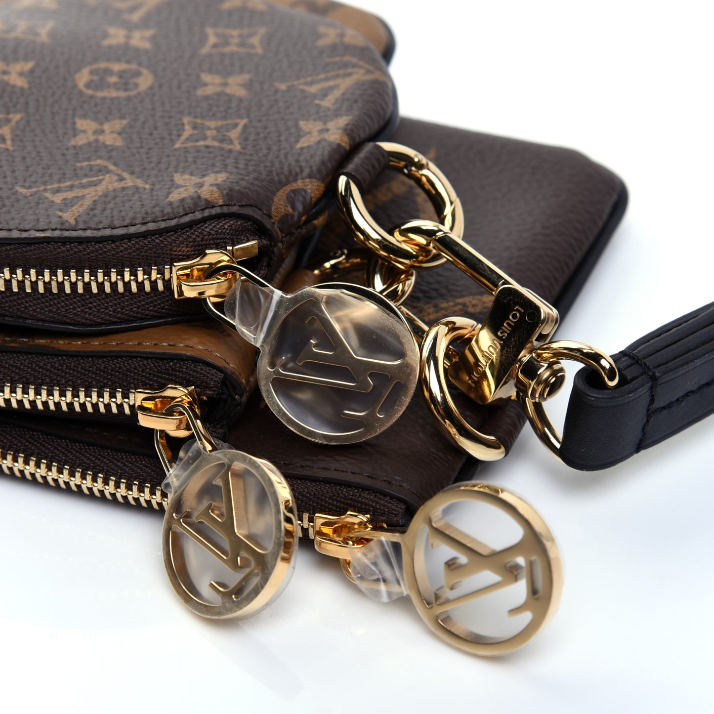 Reverse Monogram Giant Trio Pouch