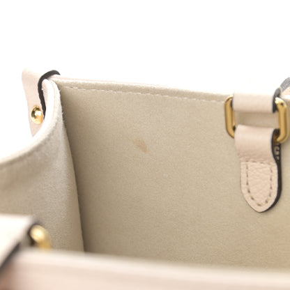 Louis Vuitton Empreinte Monogram Giant By The Pool Onthego MM Cream Saffron 15 of 18