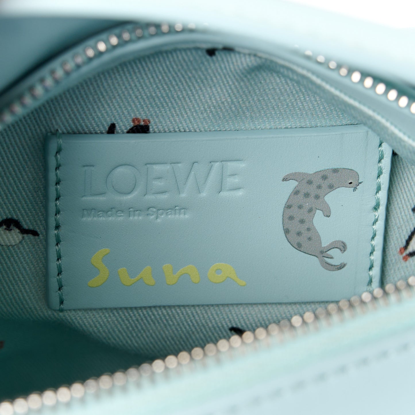 X SUNA FUJITA Shiny Calfskin Mini Penguin Puzzle Edge Bag Blue Iceberg