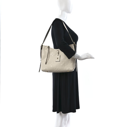 Louis Vuitton Empreinte Carryall PM Creme 2 of 10
