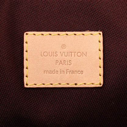 Louis Vuitton Monogram Rivoli MM 6 of 9