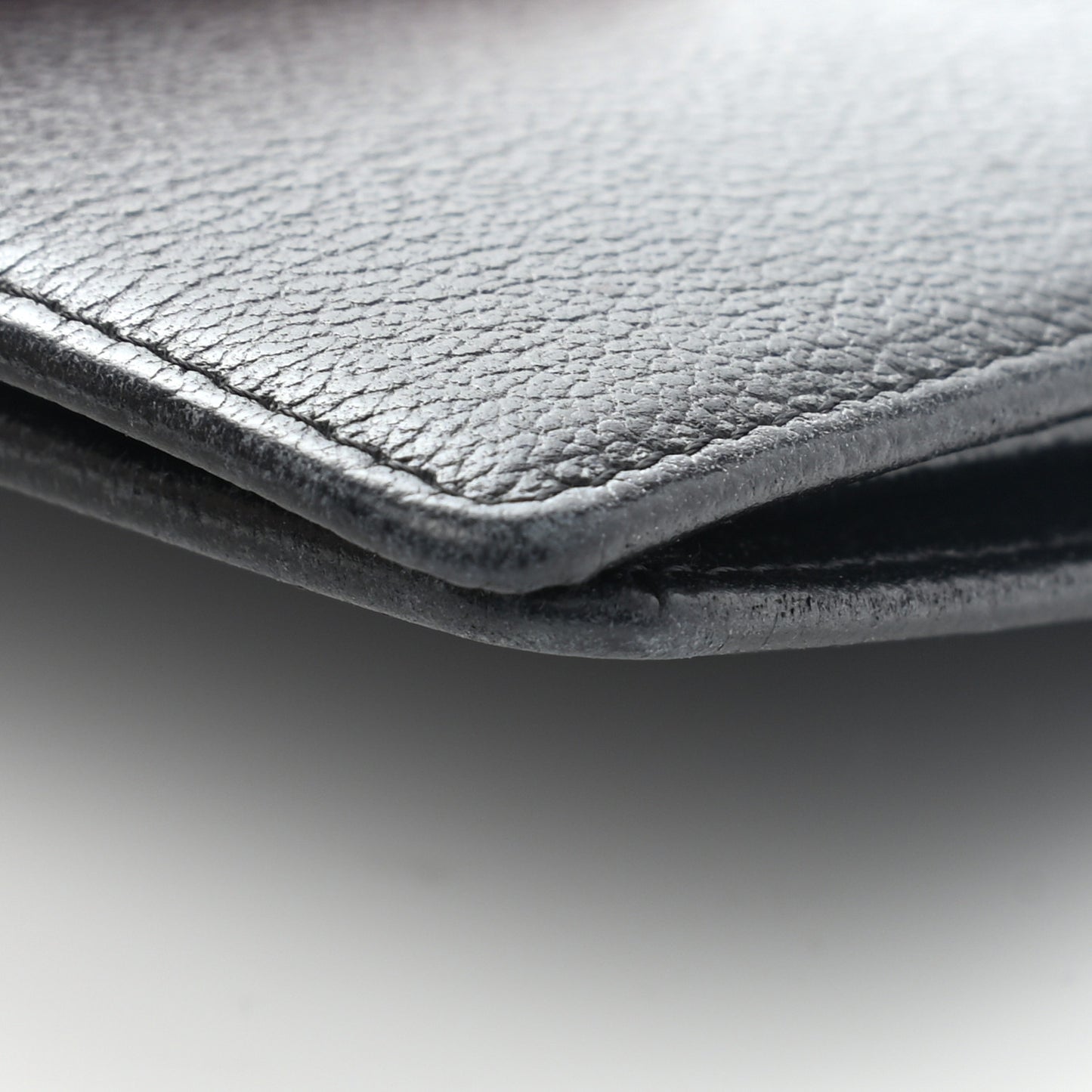 Goatskin Camellia Embossed Yen Wallet Black