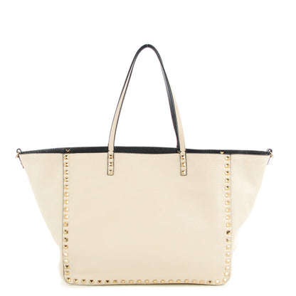 Valentino Garavani Grained Calfskin Medium Rockstud Reversible Tote Black Ivory 1 of 7
