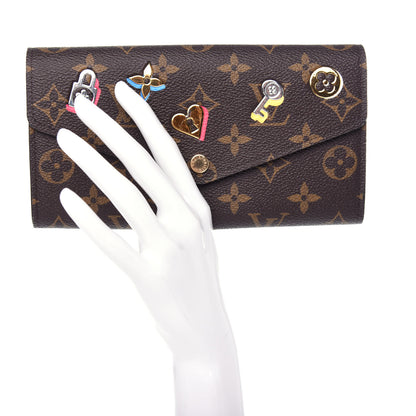 Louis Vuitton Monogram LV Love Lock Sarah Wallet 2 of 7