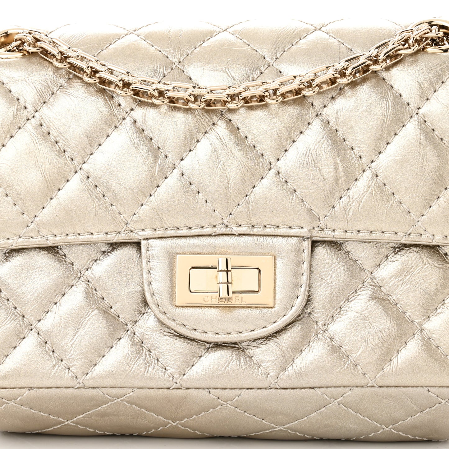 Metallic Aged Calfskin Quilted 2.55 Reissue Mini Flap Light Gold