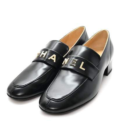 Chanel Shiny Calfskin Logo Loafers 38 Black 4 of 10
