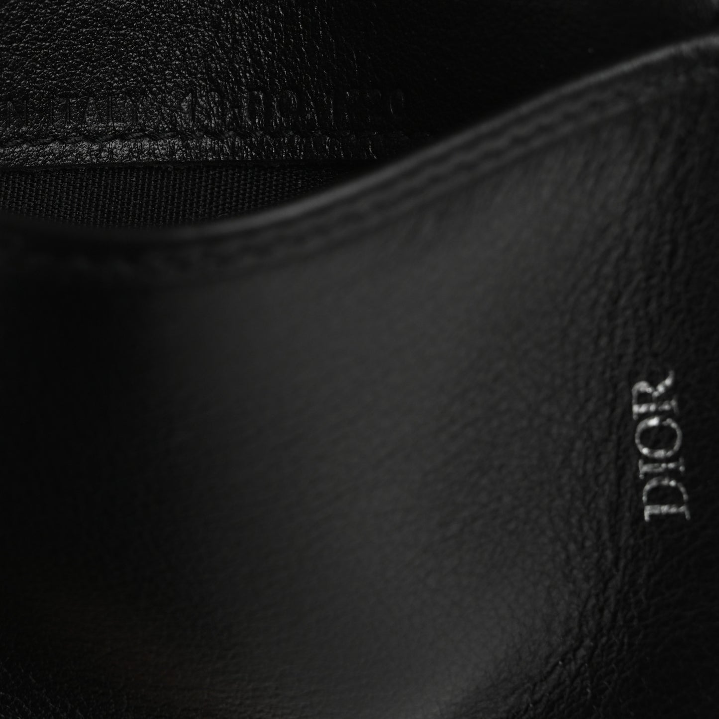Calfskin Perforated Oblique Bi-Fold Card Holder Black