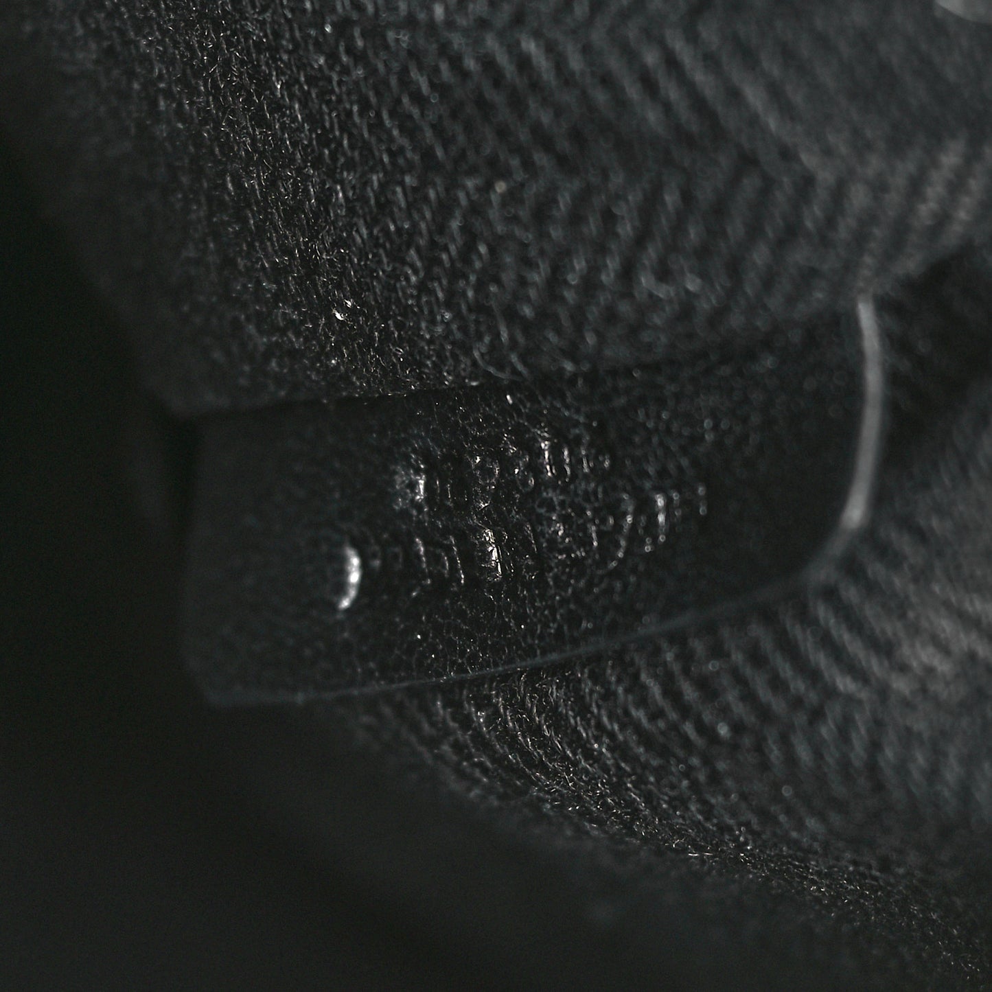 Calfskin Embossed Repeat T Pouch Black