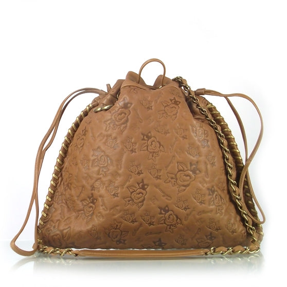Chanel Leather Camellia Embossed Drawstring Shoulder Bag 1 of 8