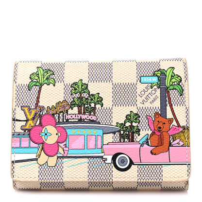 Louis Vuitton Damier Azur 2021 Christmas Animation Hollywood Victorine Wallet Fuchsia 1 of 7