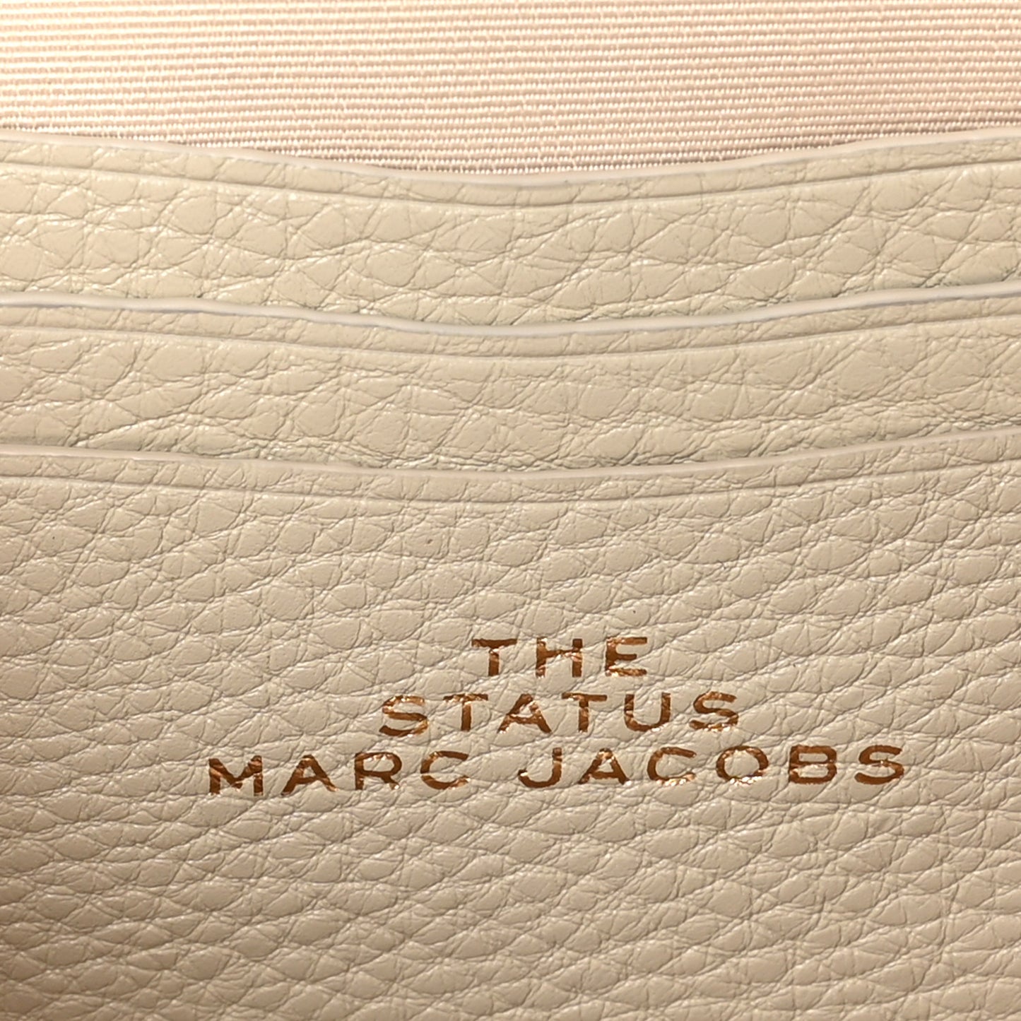 Grained Calfskin Quilted The Status Round Crossbody Oatmilk
