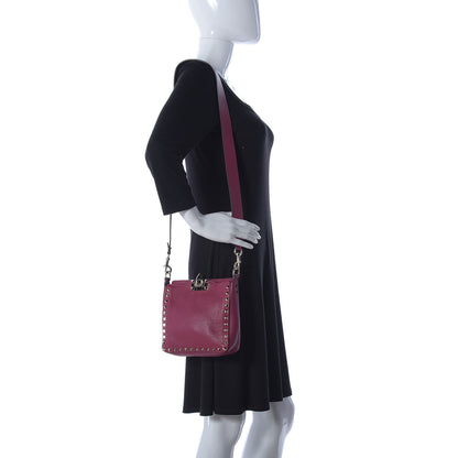 Valentino Garavani Pebbled Calfskin Mini Rockstud Flip-Lock Messenger Bag Raspberry 2 of 8