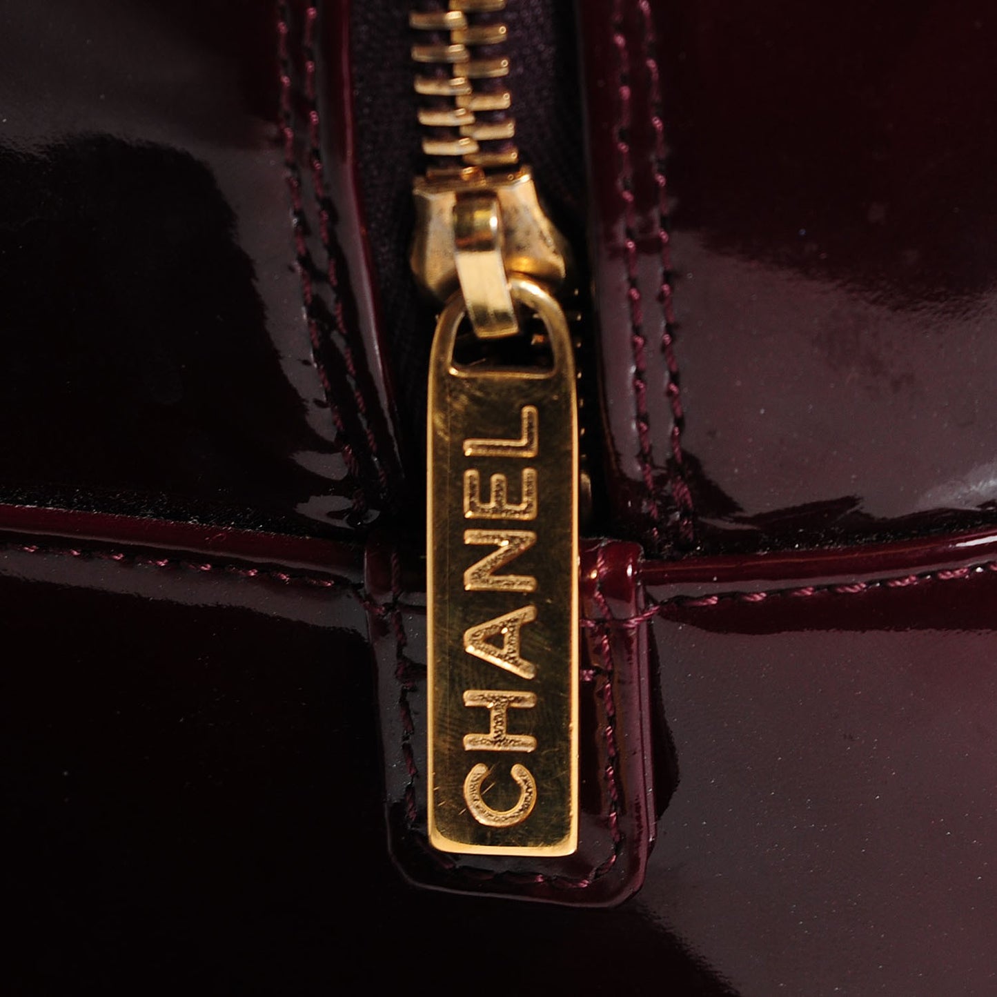 Patent Quilted Chocolate Bar Bowler Burgundy