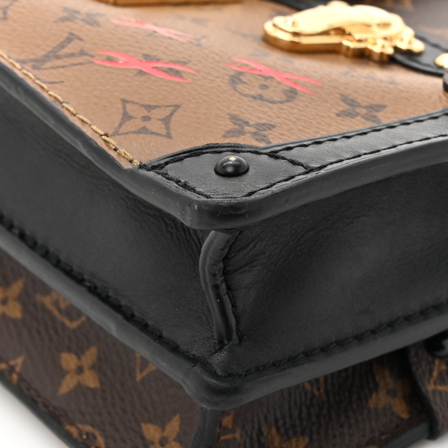 Reverse Monogram Trunk Clutch