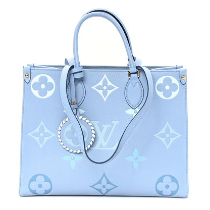 Louis Vuitton Empreinte Monogram Giant By The Pool Onthego MM Summer Blue 1 of 9