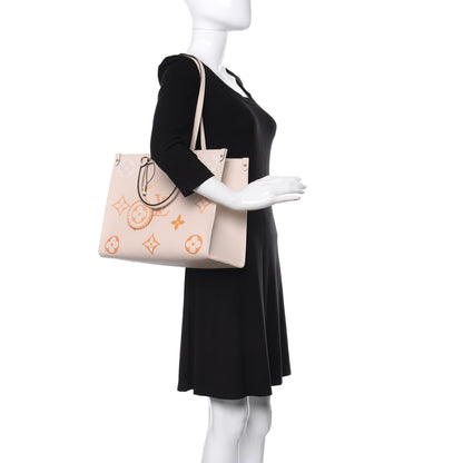 Louis Vuitton Empreinte Monogram Giant By The Pool Onthego MM Cream Saffron 2 of 10