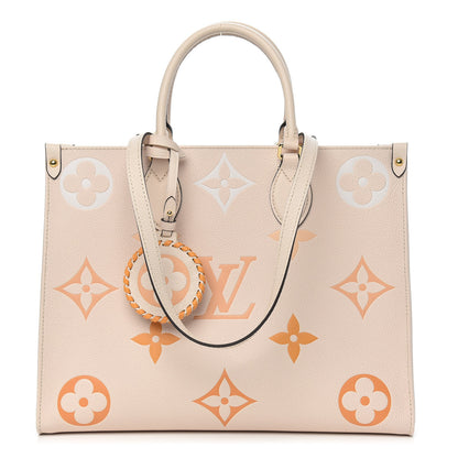 Louis Vuitton Empreinte Monogram Giant By The Pool Onthego MM Cream Saffron 1 of 11