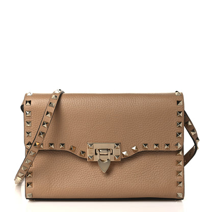 Valentino Garavani Pebbled Calfskin Medium Rockstud Flip Lock Crossbody Bag Skin Sorbet 1 of 8